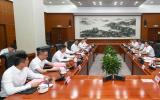 顾军会见苏州市委副书记、市长吴庆文一行